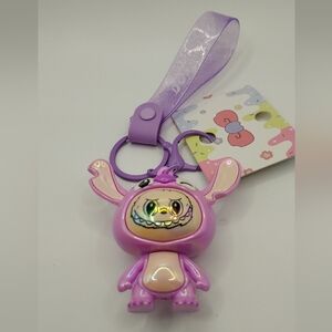 Labubu Wearing A Purple Stitch CoyKeychain BNWT